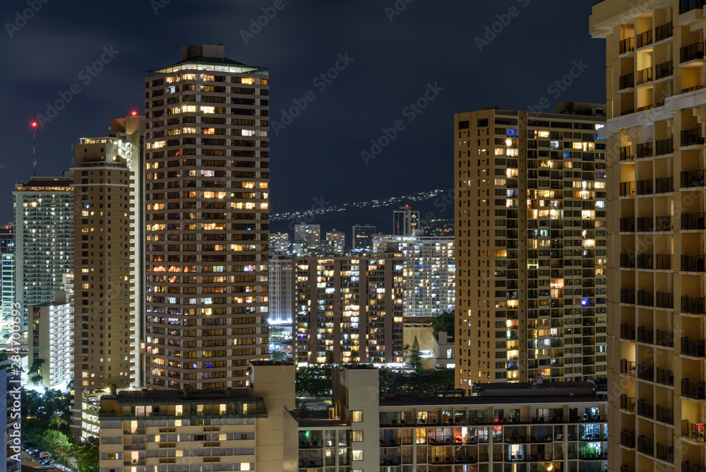 The buildings of Honolulu, Hawaii, lit up at night