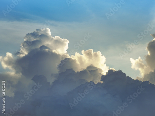 Fototapeta Naklejka Na Ścianę i Meble -  Beautiful clouds with sunset light and blue sky background. 