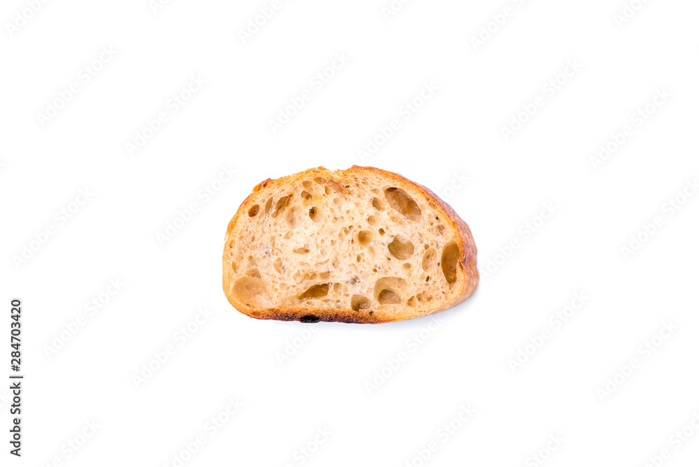 A piece of white bread isolated on a white background. Top view. A piece of white bread isolated on a white background. Top view.