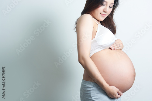 smile asian woman Pregnant in nine month