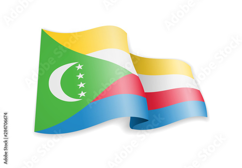 Free Download Comoros flag in the wind. Flag on white background vector illustration - GFXLoad