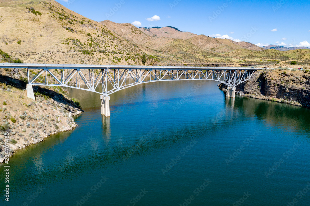 Metal strut bridge crosses Luck Peak reservoir to allow highway passage