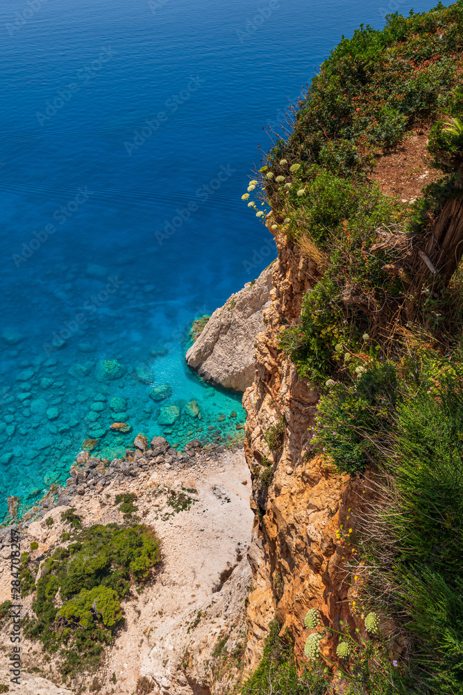 View on the crystal clear blue sea by the cliffs in the southwest of Zakynthos, near Keri