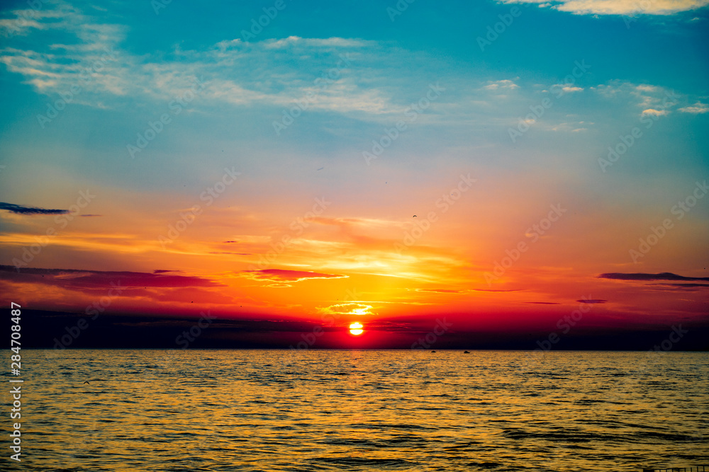 Fototapeta premium Sunset seascape from the beach