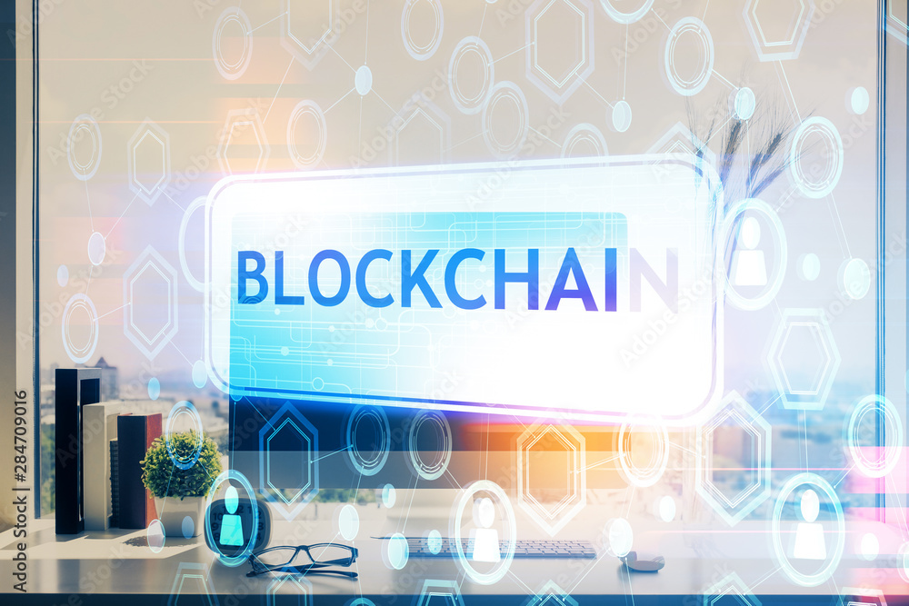 Double exposure of blockchain and crypto economy theme hologram and table with computer background. Concept of bitcoin cryptocurrency. Double exposure of blockchain and crypto economy theme hologram and table with computer background. Concept of bitcoin cryptocurrency.