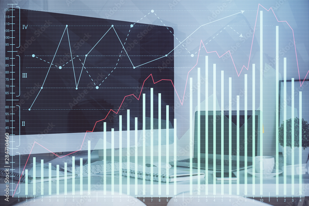Forex market chart hologram and personal computer background. Double exposure. Concept of investment. Forex market chart hologram and personal computer background. Double exposure. Concept of investment.