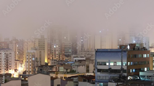 Magical fog rolling over Colombian City photo