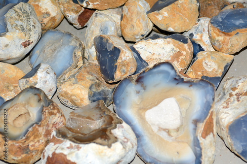 Untreated onyx stones are white-blue. Concept - Mineralogy