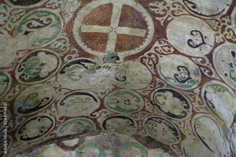 Ancient colored mosaic on the floor of a religious building. Concept - Antiquity