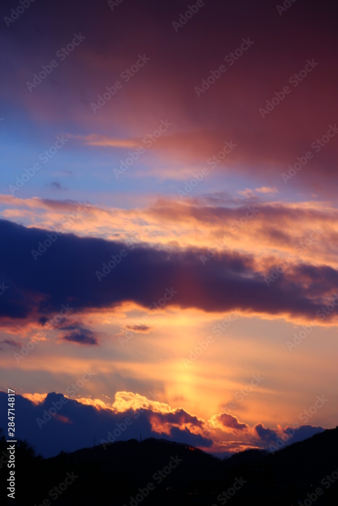 Fototapeta premium 夕焼け 太陽柱