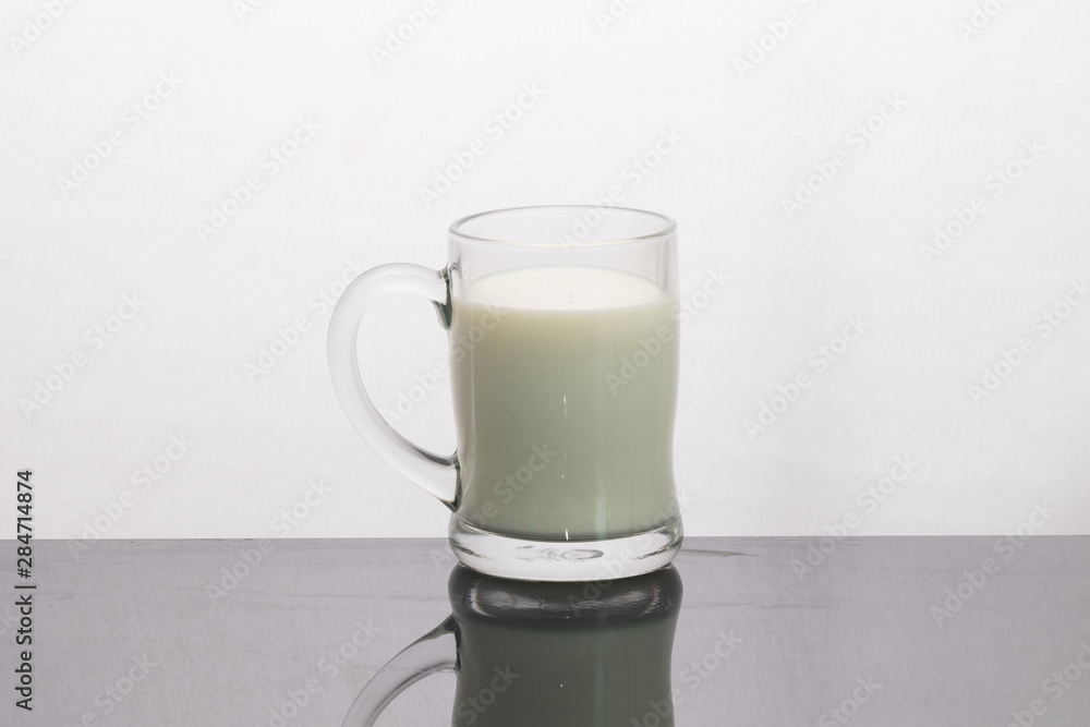 glass of milk on white background glass of milk on white background