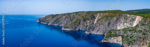 Panoramic view over the cliffs and the deep blue Mediterranean sea at Kambi, Zakynthos, Greece photo