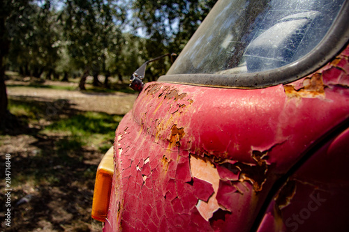 paint peeling off of a abandoned red t2