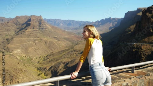 Blonde Female Model at the View Point Admiring the Gran Canaria Landscape