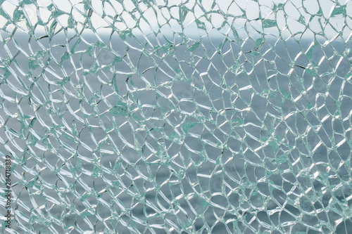 Broken glass with sea on background