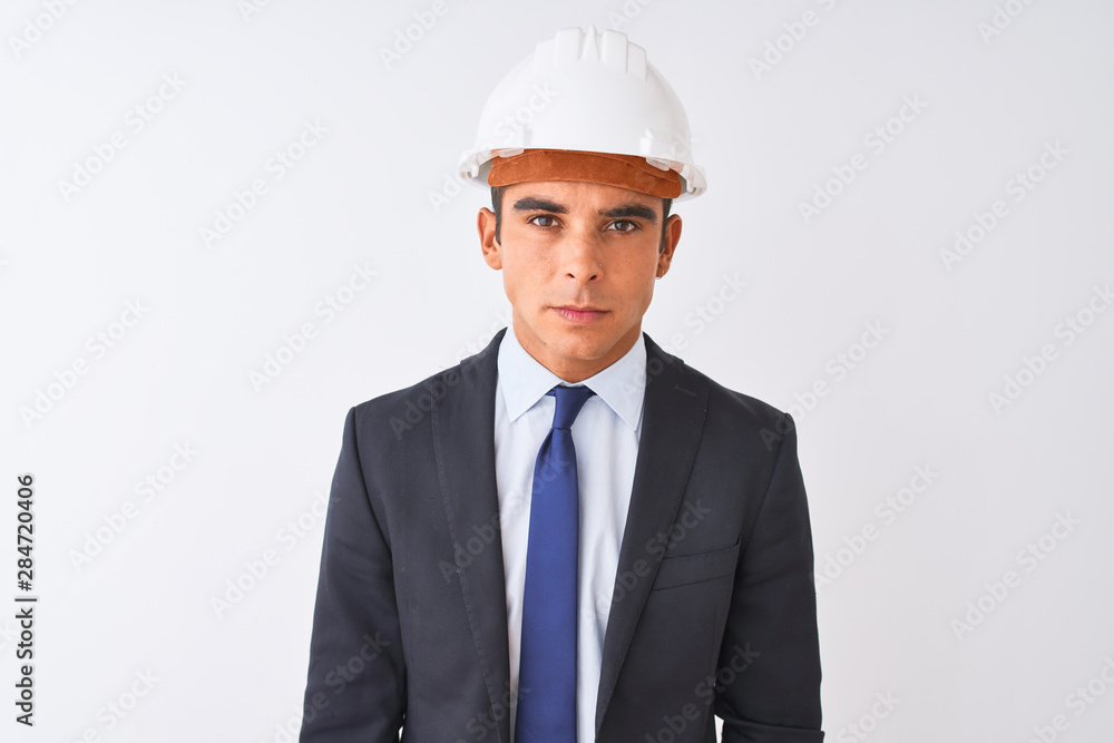 Young handsome architect man wearing suit and helmet over isolated white background skeptic and nervous, frowning upset because of problem. Negative person. Young handsome architect man wearing suit and helmet over isolated white background skeptic and nervous, frowning upset because of problem. Negative person.