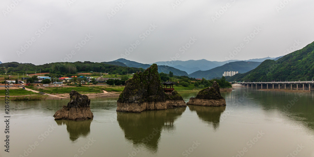 Dodamsambong Peaks are three stone peaks rising out of the Namhangang River. Danyang, North Chungcheong, South Korea, Asia.