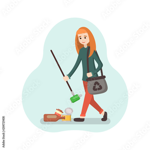 Volunteer girl collects trash