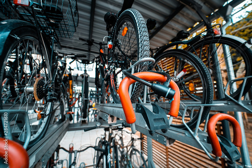 Many bicycle in a row. Bicycle parking at the street photo