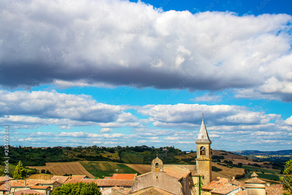 Beautiful landscape of a French village against the sky and nature.
