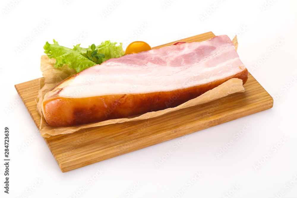 Smoked pork breast with salad leaves