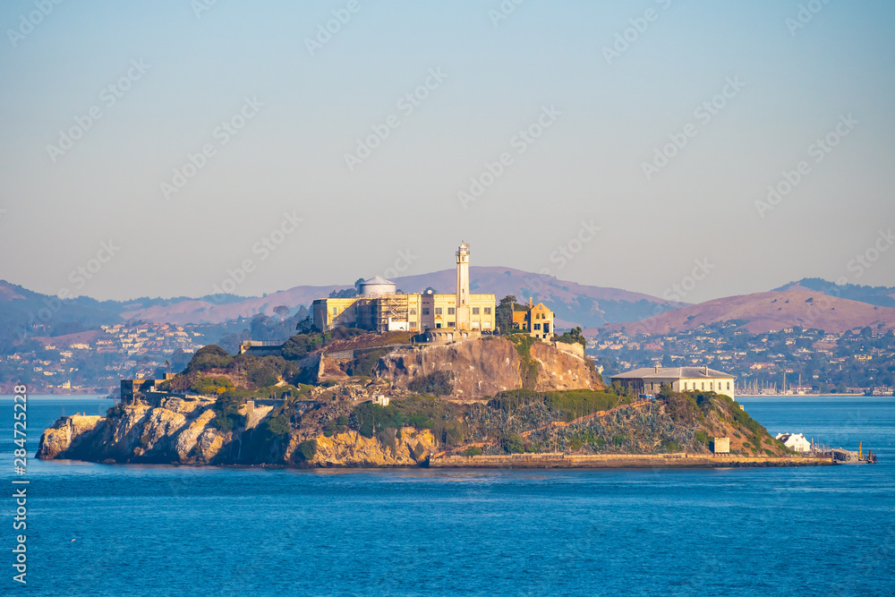 Alcatraz Prison Island in San Francisco Bay, offshore from San Francisco, California, a small island with military fortification and federal prison, now a famous national historical landmark. Alcatraz Prison Island in San Francisco Bay, offshore from San Francisco, California, a small island with military fortification and federal prison, now a famous national historical landmark.