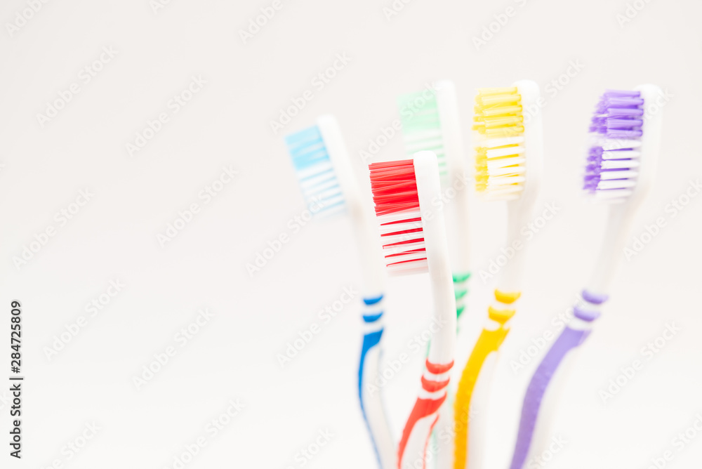 set of plastic toothbrushes on white background set of plastic toothbrushes on white background