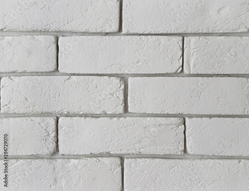 Modern white brick wall texture as a background. Abstract backdrop
