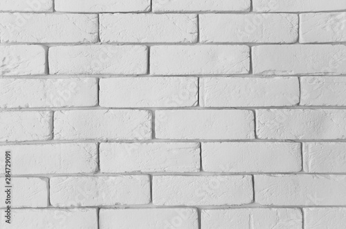 Modern white brick wall texture as a background. Abstract backdrop