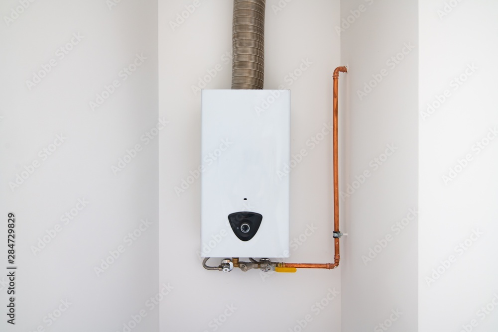 Modern home gas water heater on the wall