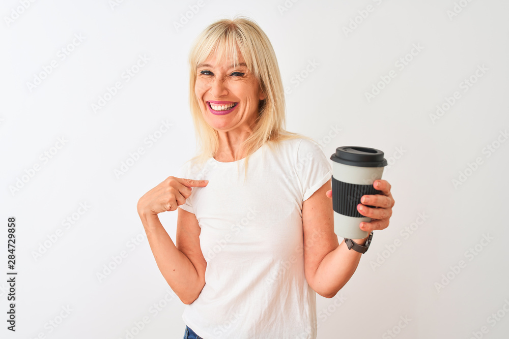 Middle age woman drinking glass of take away coffee standing over isolated white background with surprise face pointing finger to himself