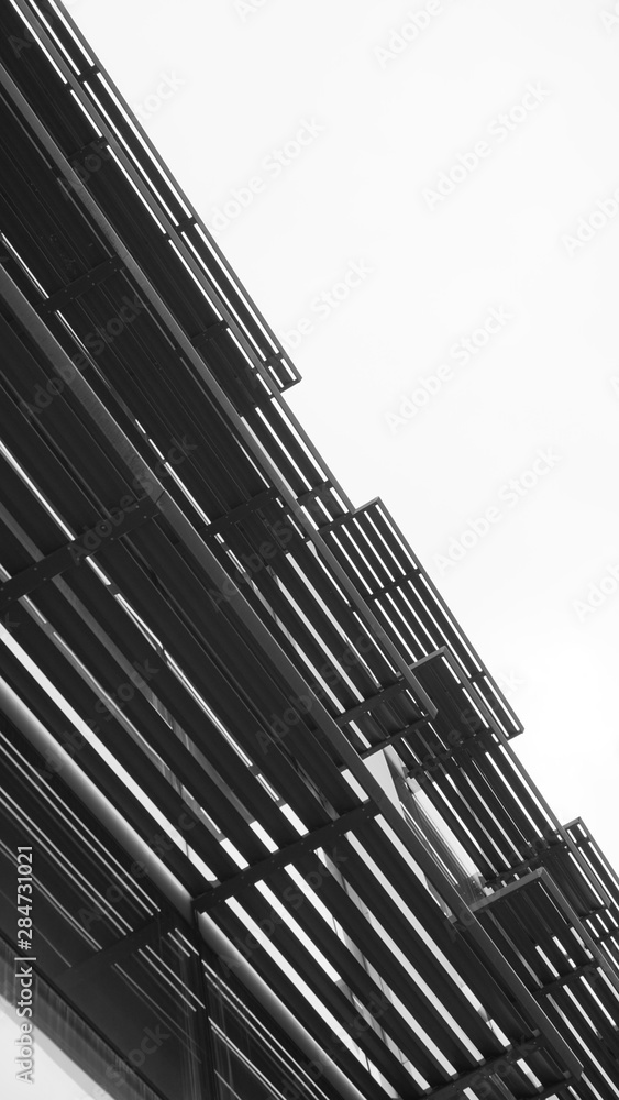 Construction abstract composition metal shutter on the facade vertical Construction abstract composition metal shutter on the facade vertical