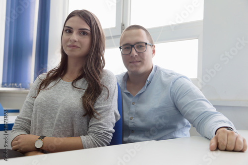 Campus life, students Love. Couple of students with a books. Education, dating, lifestyle concept.