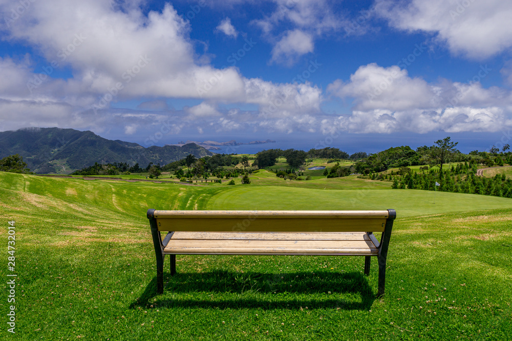 Park bench outdoor landscape. Wooden bench in golf course landscape. Mountain park bench panorama. Park bench relax Park bench outdoor landscape. Wooden bench in golf course landscape. Mountain park bench panorama. Park bench relax