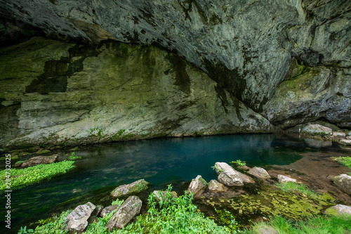 Blue lake near the entrance to Shulgan Tash cave