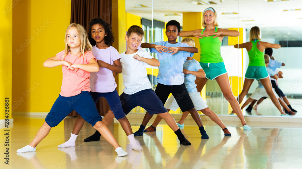 Tweens training movements of modern dance