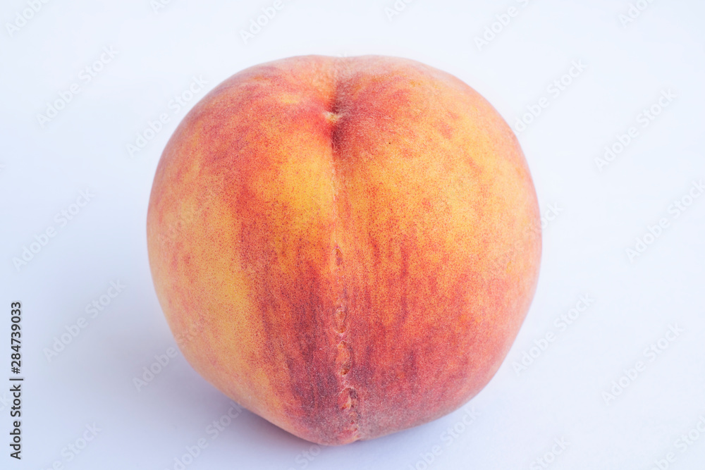 Red peach with leaf isolated on white background. Full depth of field (all details in focus). Clipping path included. Red peach with leaf isolated on white background. Full depth of field (all details in focus). Clipping path included.