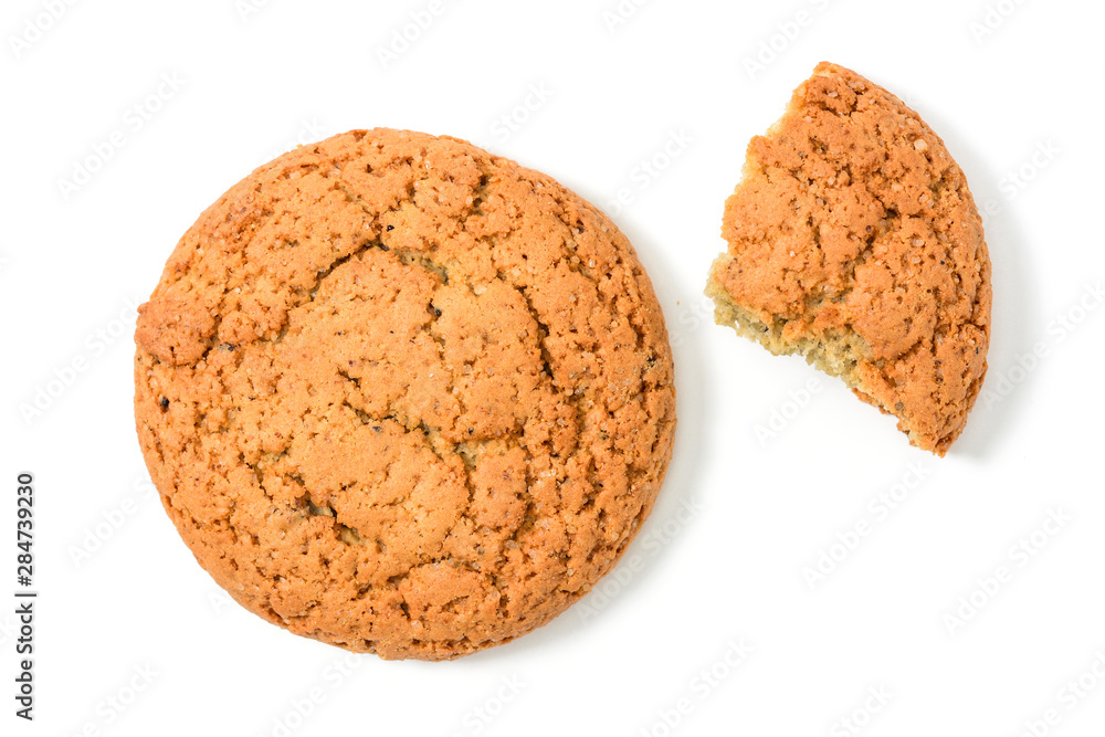 Homemade cookies. Whole and piece sweet cookie with crumbs made from oatmeal flour. Tasty biscuit in high resolution closeup, isolated on white background top view with shadows. Homemade bakery. Homemade cookies. Whole and piece sweet cookie with crumbs made from oatmeal flour. Tasty biscuit in high resolution closeup, isolated on white background top view with shadows. Homemade bakery.
