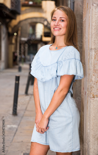 Girl in blue dress posing in Barcelona