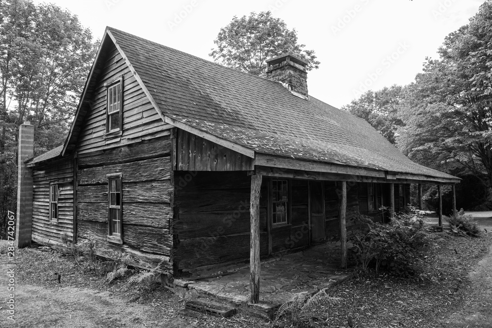 An old dilapidated broken down vacant home with broken windows in rural Western North Carolina An old dilapidated broken down vacant home with broken windows in rural Western North Carolina