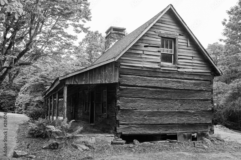 An old dilapidated broken down vacant home with broken windows in rural Western North Carolina An old dilapidated broken down vacant home with broken windows in rural Western North Carolina