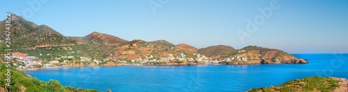 Bali, Island Crete, Greece, Sunny day with mountains, Aegean sea, plants and beaches. Bali - vacation destination resort, with clear turquoise ocean waters, Rethymno, Crete, Greece. Panoramic view.