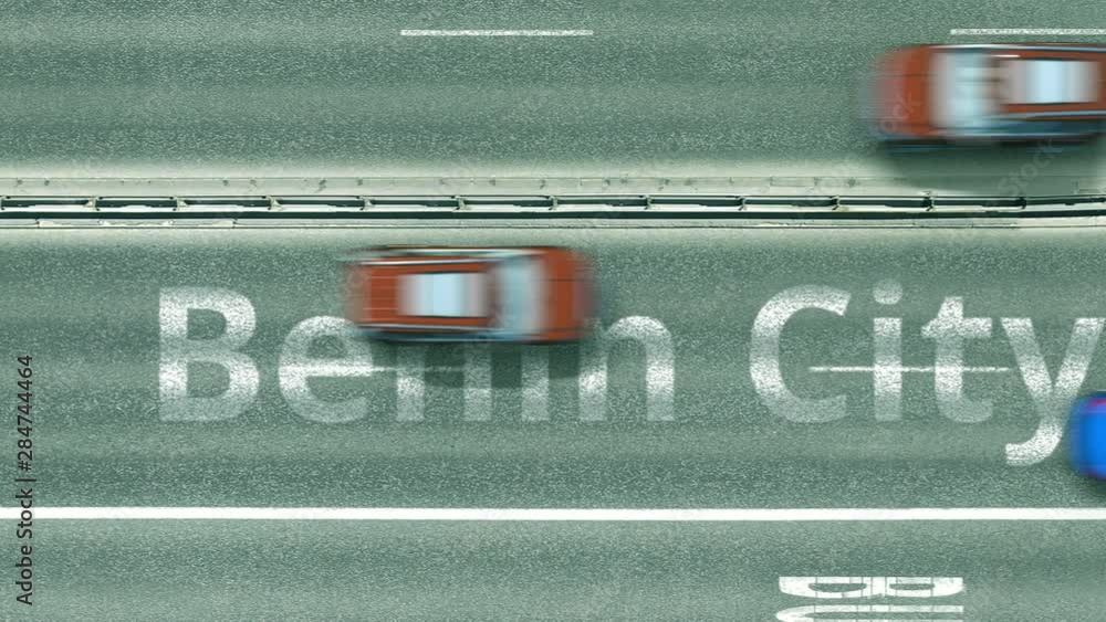 Top down view of the highway with revealing Benin City text. Driving in Nigeria intro clip Top down view of the highway with revealing Benin City text. Driving in Nigeria intro clip