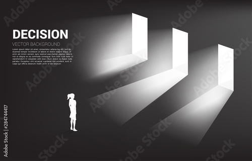time to make decision in business direction. Silhouette of businesswoman standing to select door to enter