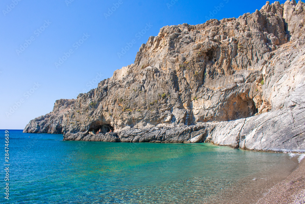 Tripiti beach with colordul sea east Crete. Filakas mountain near to Lendas, Crete Greece. Beautiful landscape sea and mountains. Copy space for text. Tripiti beach with colordul sea east Crete. Filakas mountain near to Lendas, Crete Greece. Beautiful landscape sea and mountains. Copy space for text.