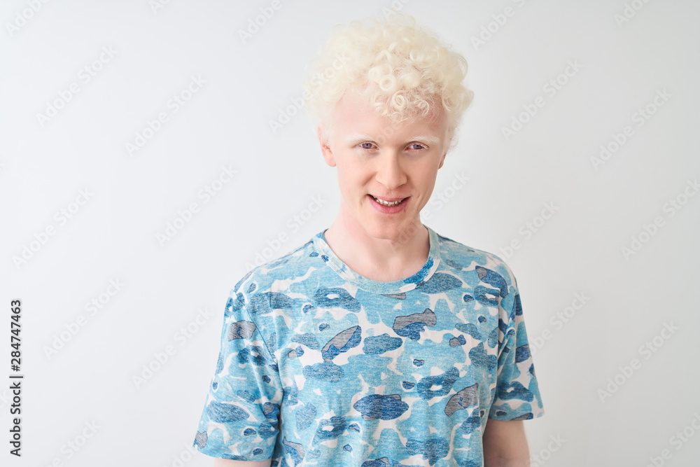 Young albino blond man wearing casual t-shirt standing over isolated white background with a happy and cool smile on face. Lucky person. Young albino blond man wearing casual t-shirt standing over isolated white background with a happy and cool smile on face. Lucky person.