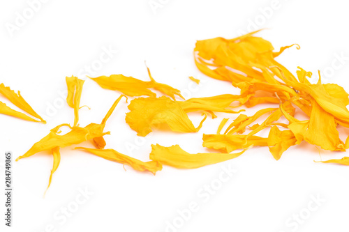 Dry marigold petal flowers isolated on white background. Herbal tea from flowers of a marigold