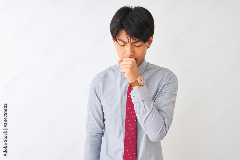 Chinese businessman wearing elegant tie standing over isolated white background feeling unwell and coughing as symptom for cold or bronchitis. Healthcare concept. Chinese businessman wearing elegant tie standing over isolated white background feeling unwell and coughing as symptom for cold or bronchitis. Healthcare concept.
