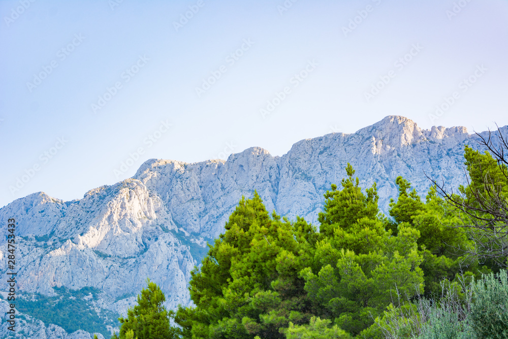 Summer vacation on Brac island. Beautiful alpine landscape. Landscape background of rocky mountains of Chroatia.