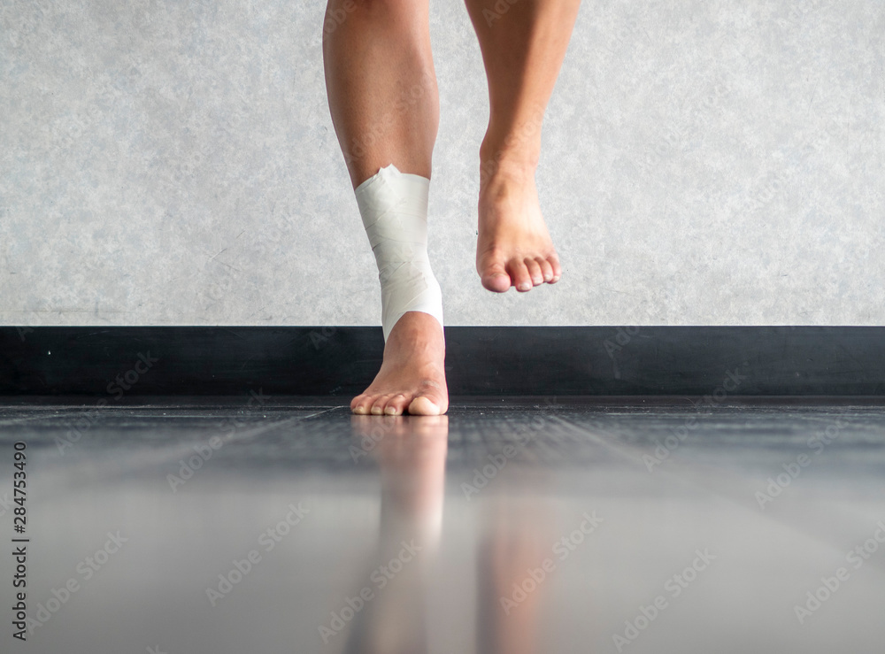 Athlete Balancing To Regain Proprioception On Sprained Ankle Stock